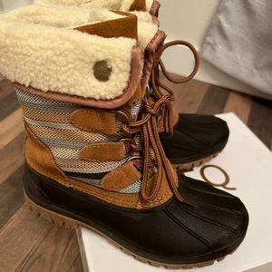 Snow/rain boots. Lined and warm. Cozy all around